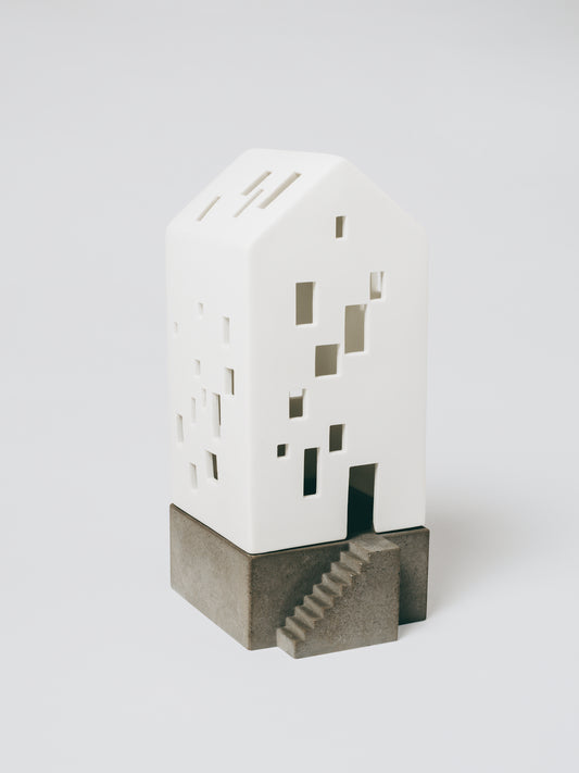 RAEDER DESIGN Lichthaus kleines Apartmenthaus mit Betonsockel