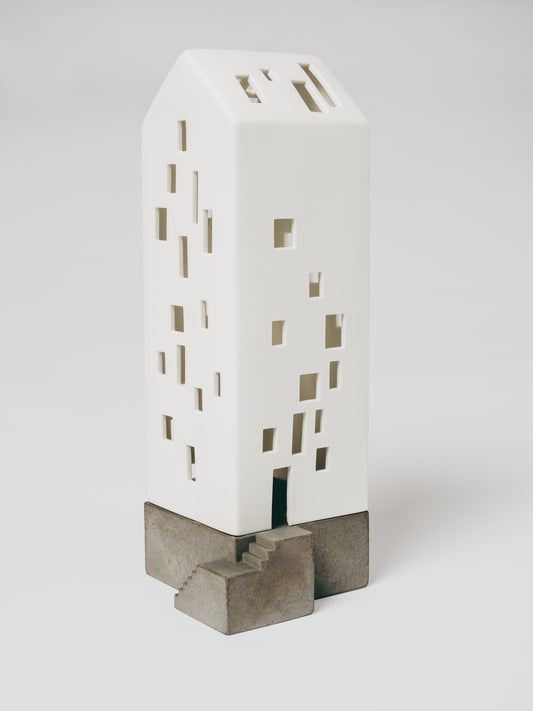 RAEDER DESIGN Lichthaus Apartmenthaus mit Betonsockel
